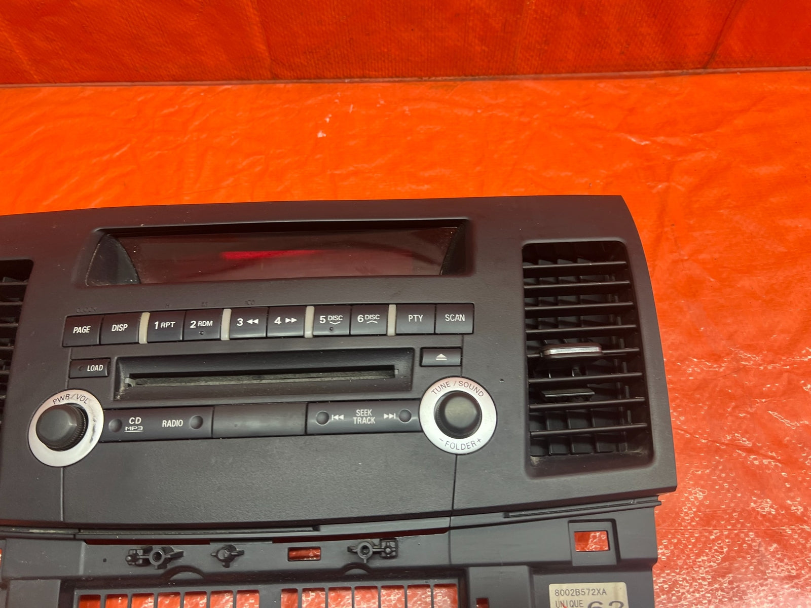 12 13 LANCER EVOLUTION X EVO 10   5 SPEED   RADIO STEREO FACE PLATE   OEM #1775