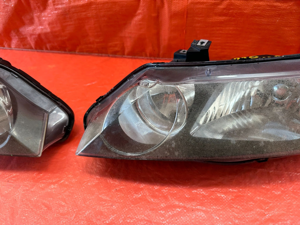 06 08 HONDA CIVIC SEDAN   LEFT & RIGHT AFTERMARKET BLACK HOUSING HEADLIGHTS #22018