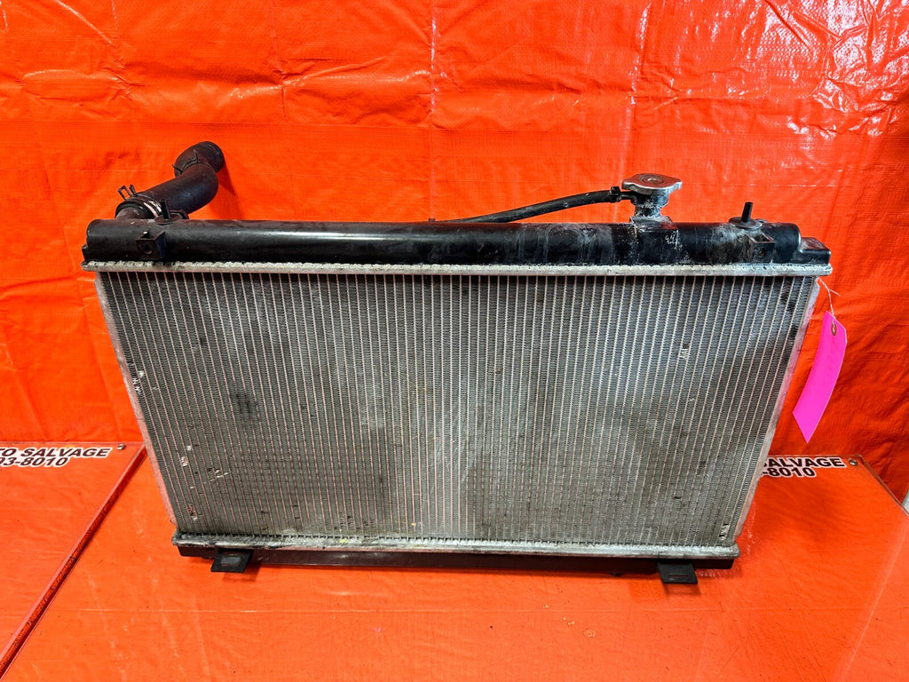 03 07 NISSAN 350Z   AUTOMATIC RADIATOR W/ FANS AND HOSES   1 FAN BAD THO OEM 26214