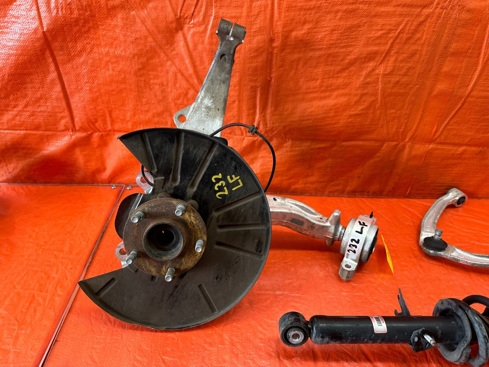 08 15 INFINITI G37 COUPE S   LEFT FRONT SPINDLE W/ CONTROL ARMS & SHOCK OEM #23212