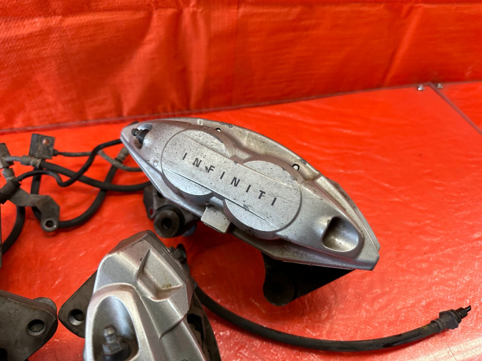 08 15 INFINITI G37 & Q60 SPORT   AKEBONO   BRAKE CALIPERS LEFT & RIGHT   OEM 18813