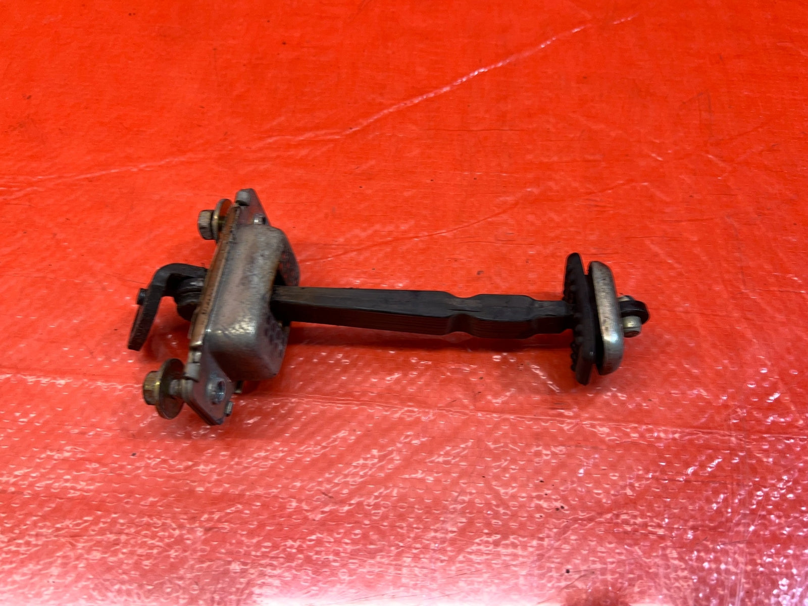 98 02 HONDA ACCORD SEDAN   PASSENGER REAR DOOR CHECKER HINGE ARM STOPPER OEM 16711