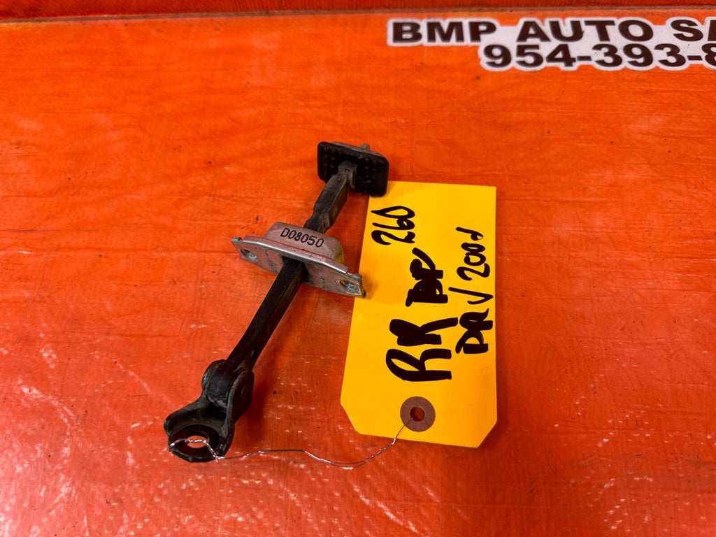 06 11 CIVIC 4D SEDAN   PASSENGER RIGHT REAR DOOR CHECKER HINGE ARM STOPPER #2607