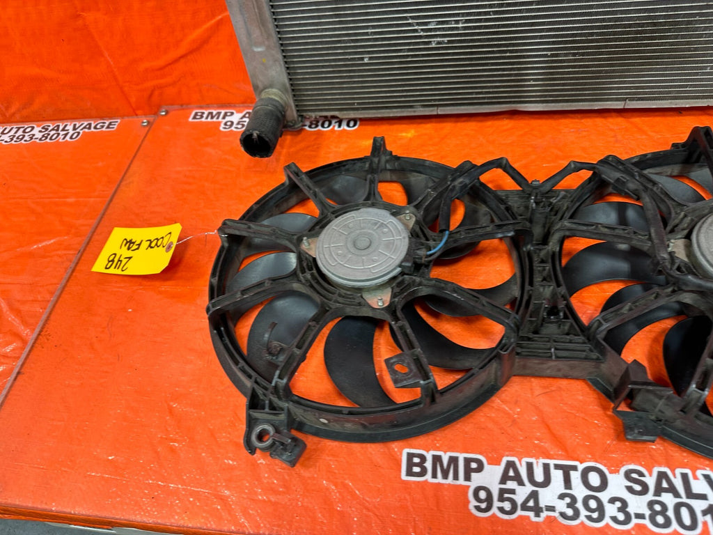 08 15 INFINITI G37 & Q60   6 SPEED MANUAL ONLY   RADIATOR W/ BOTH FANS OEM #24811