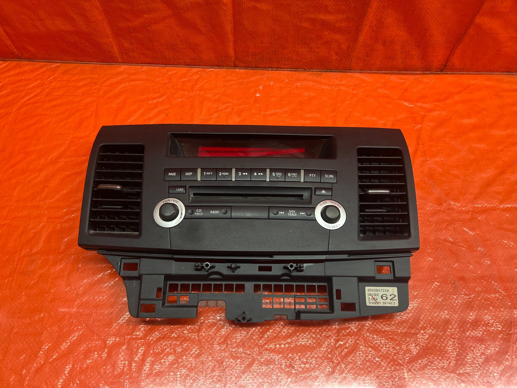 12 13 LANCER EVOLUTION X EVO 10   5 SPEED   RADIO STEREO FACE PLATE   OEM #1770