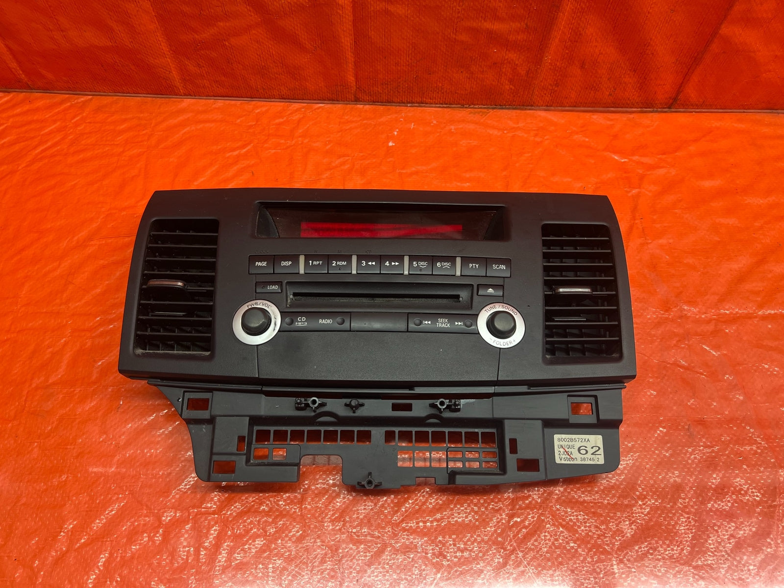 12 13 LANCER EVOLUTION X EVO 10   5 SPEED   RADIO STEREO FACE PLATE   OEM #1770