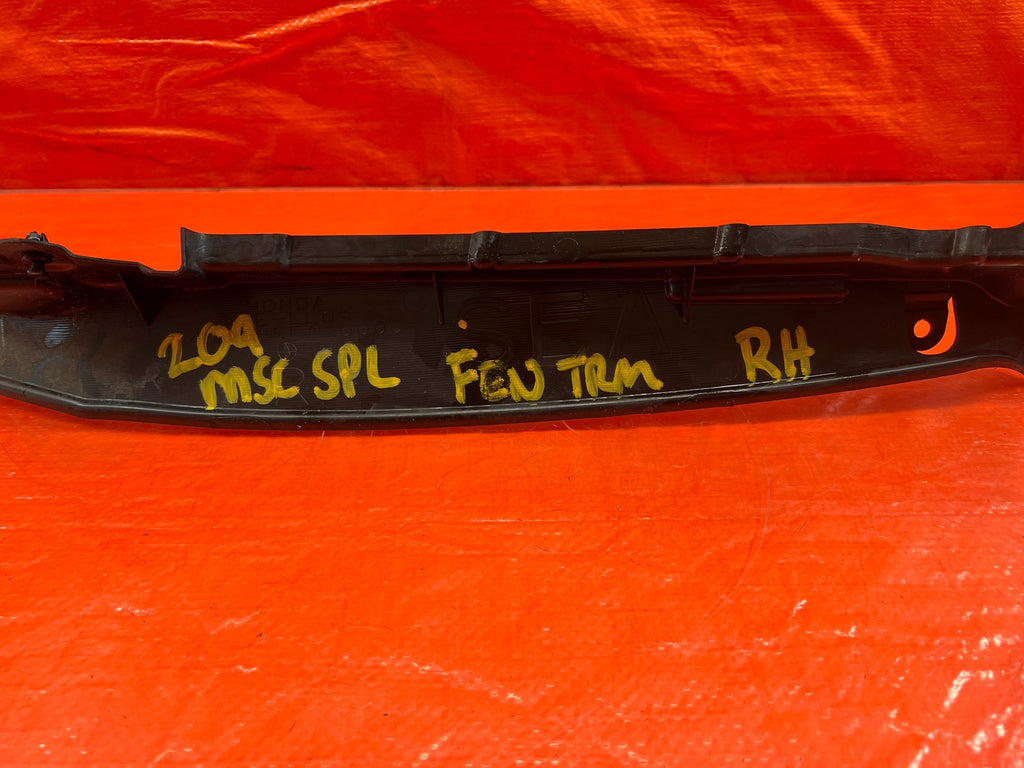 04 08 ACURA TSX   PASSENGER RIGHT   FENDER ENCLOSURE TRIM   OEM FACTORY #20912