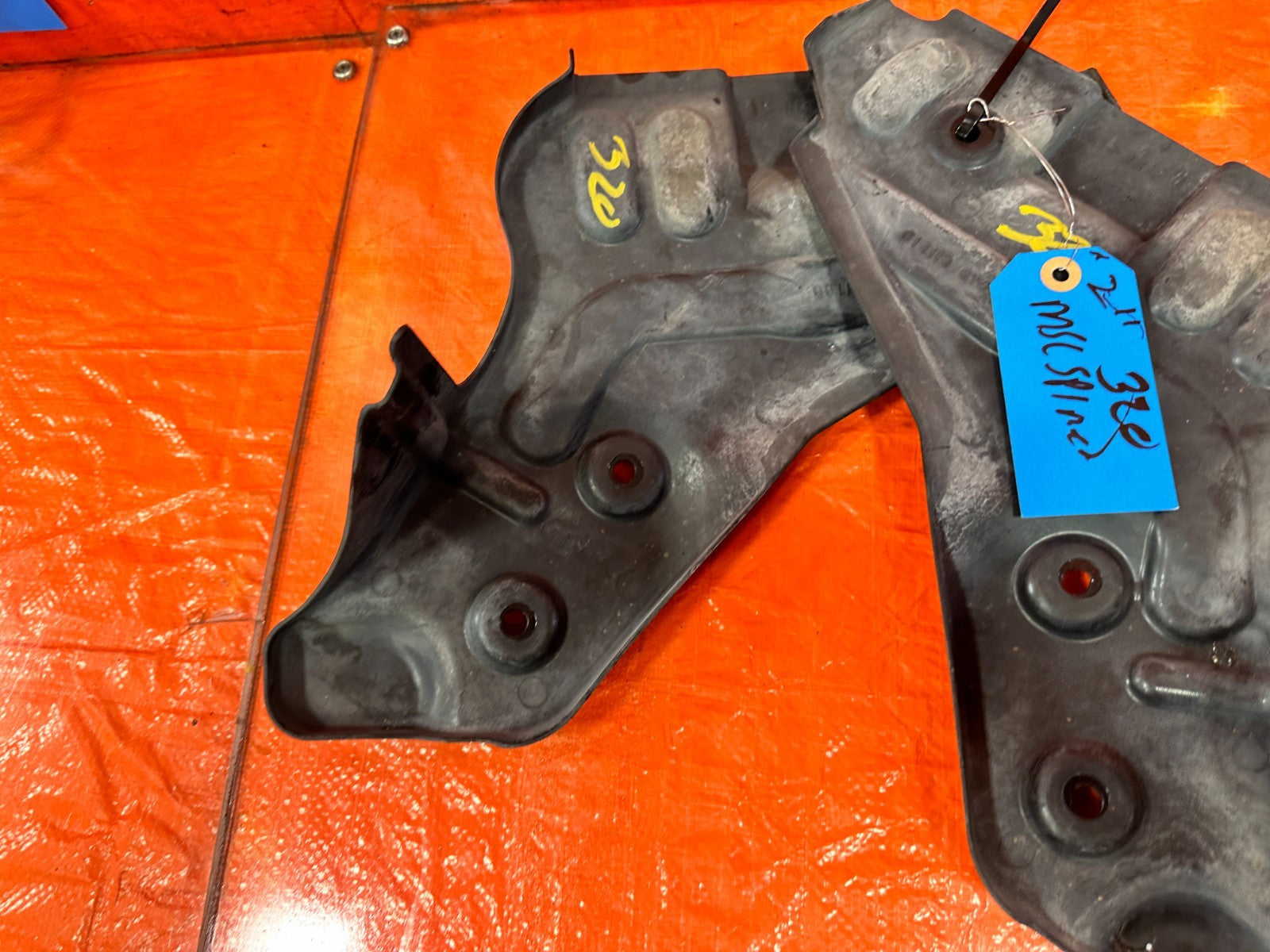 08 15 INFINITI G37 & Q60 COUPE LEFT AND RIGHT REAR SUBFRAME BRACKET DUST SHIELDS8